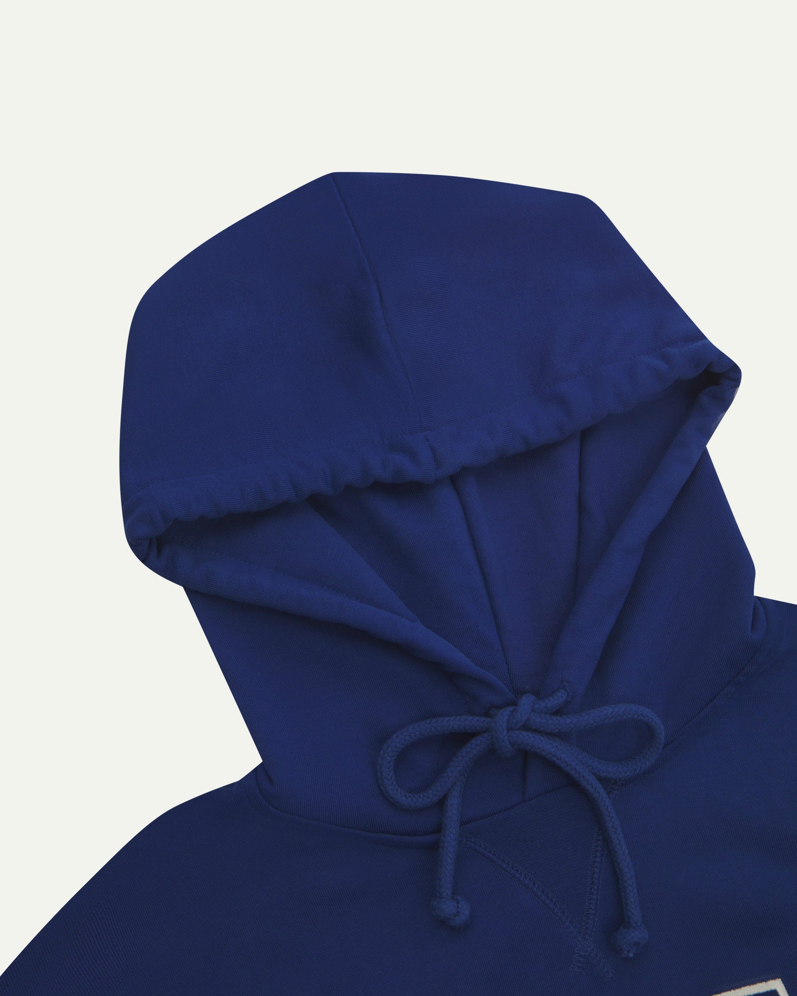 Front close up shot of Uskees signature ultra blue men's hooded sweatshirt showing the hood and neck drawstring detail.