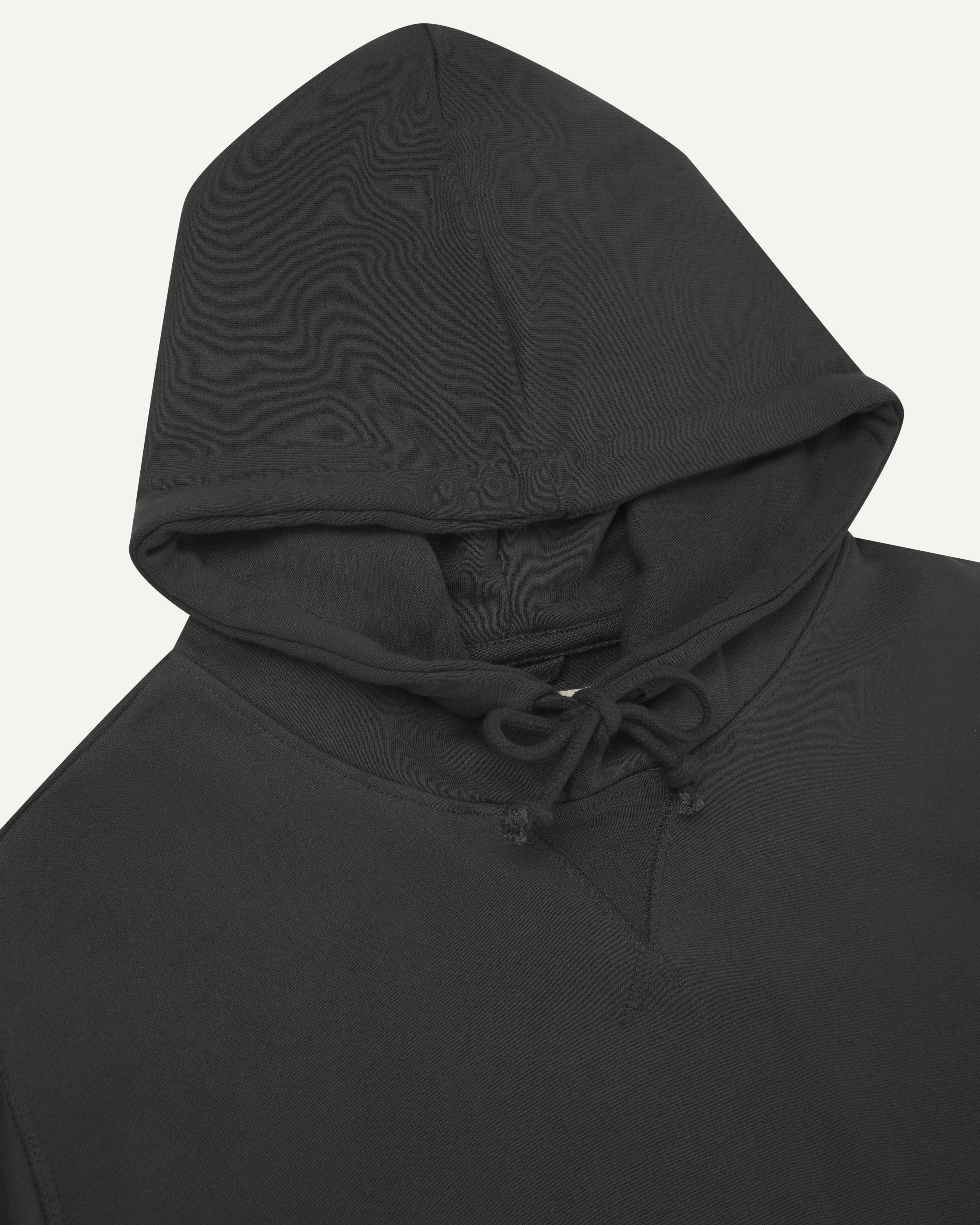 Front close up view of dark grey organic heavyweight cotton #7004 jersey hoodie by Uskees showing hood detail