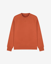 Front view of cinnamon-orange organic heavyweight cotton 7005 sweatshirt by Uskees demonstrating regular, flattering shape.