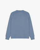 Back view of men's cornflower blue organic heavyweight cotton 7005 jersey sweatshirt by Uskees, showing ribbed cuffs and hem.