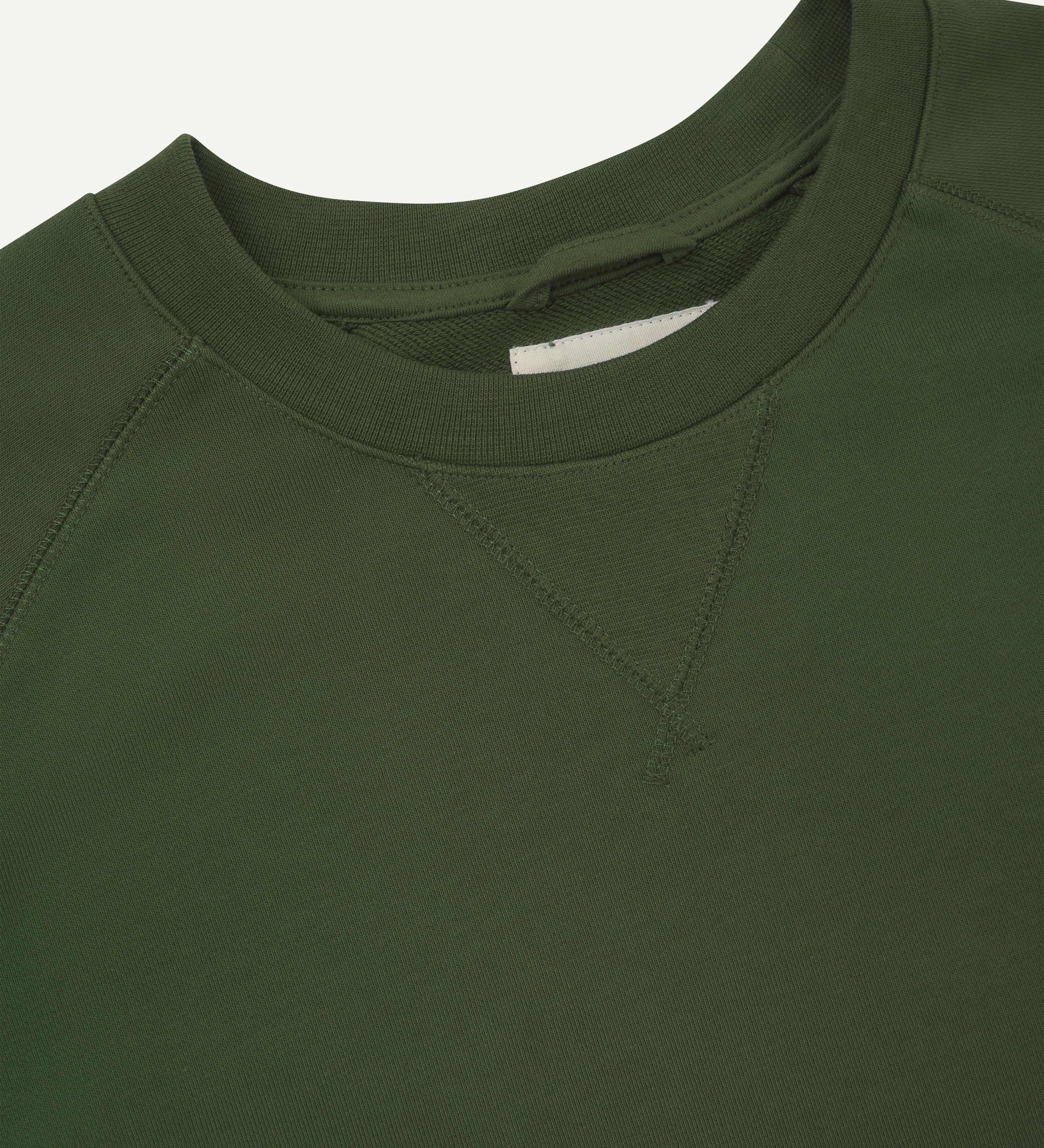 Front close-up collar view of green organic heavyweight cotton #7005 jersey sweatshirt by Uskees.