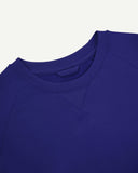 Close up neckline view of ultra-blue organic heavyweight cotton 7005 sweatshirt by Uskees showing crew neck and decorative v-insert
