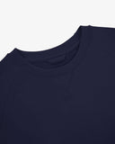 Close up shot of Uskees dark blue sweatshirt for men showing the neckline detail.