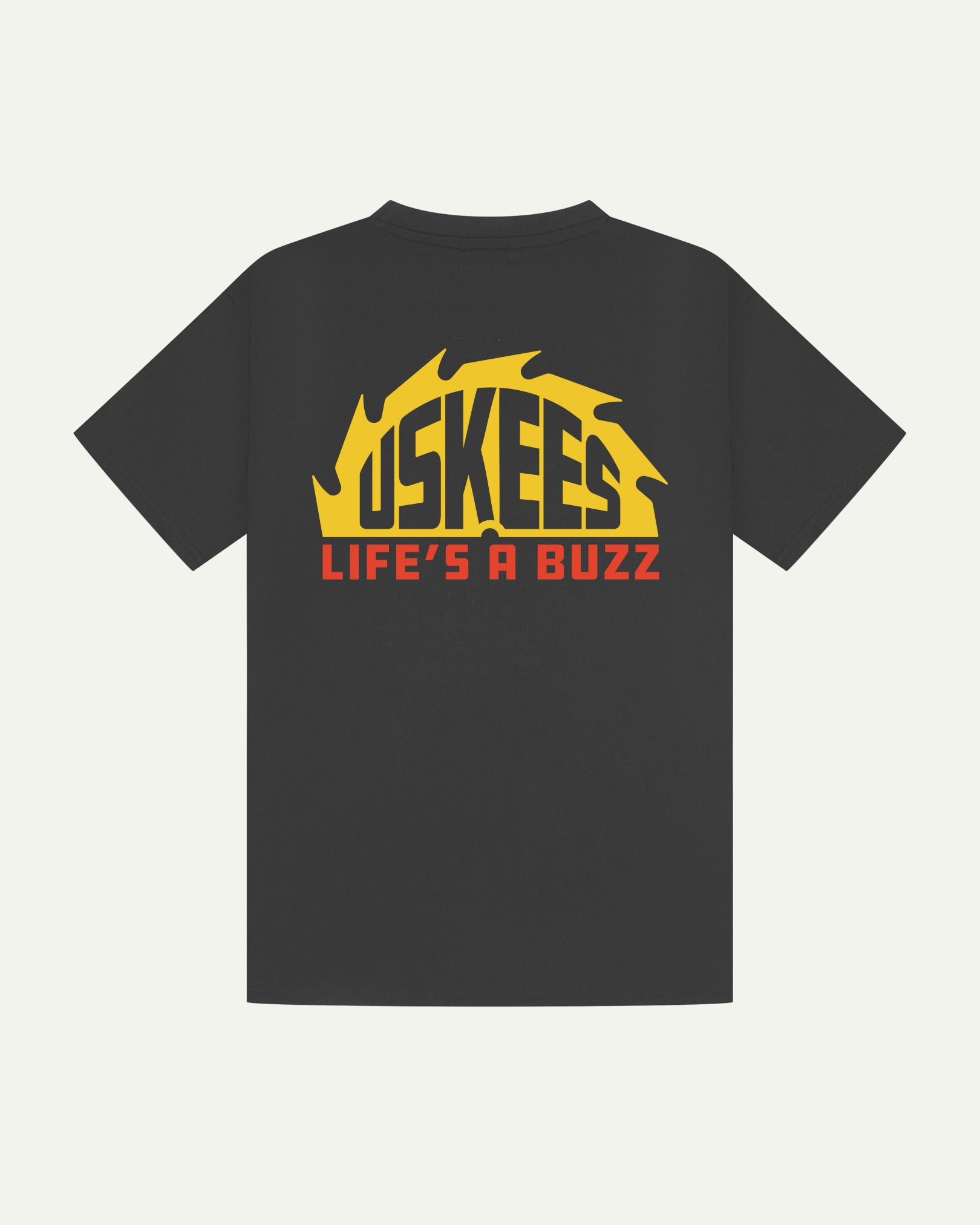 Reverse view of Uskees men's graphic 'life's a buzz' short sleeve Tee for men showing the large graphic buzz saw logo in yellow and orange across the back.