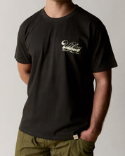 Front view wearing the uskees men's 'diner' tee in faded black demonstrating the loose, relaxed fit.