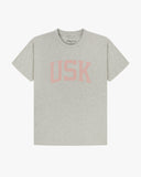 Full flat view of grey marl organic cotton signature T-shirt for men, showing the varsity inspired 'USK' logo on the chest and the Uskees branding labels on the neck and hem.