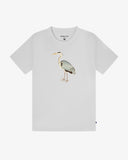 Front view of an Uskees white short-sleeve crewneck t-shirt featuring a detailed graphic of a heron bird printed on the center chest, displayed against a clean white background.