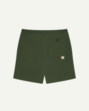 Back view of coriander-green men's organic cotton 7007 men's shorts by Uskees against white background. Clear view of pocket and logo label.