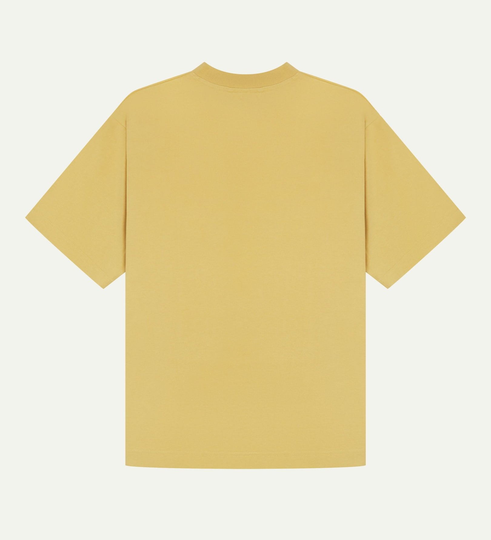 Back view of sandstone-yellow organic cotton Uskees short-sleeved T-shirt, showing the looser, oversized silhouette.