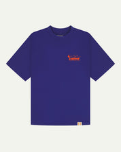 Full flat view of oversized ultra blue organic cotton Uskees T-shirt for men, showing the small bright orange 'diner' logo on the breast.