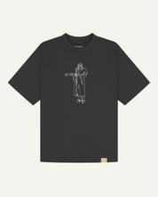 front flat shot of the uskees oversized graphic Tee for men in faded black showing the 'Jazz Man' line drawing in white