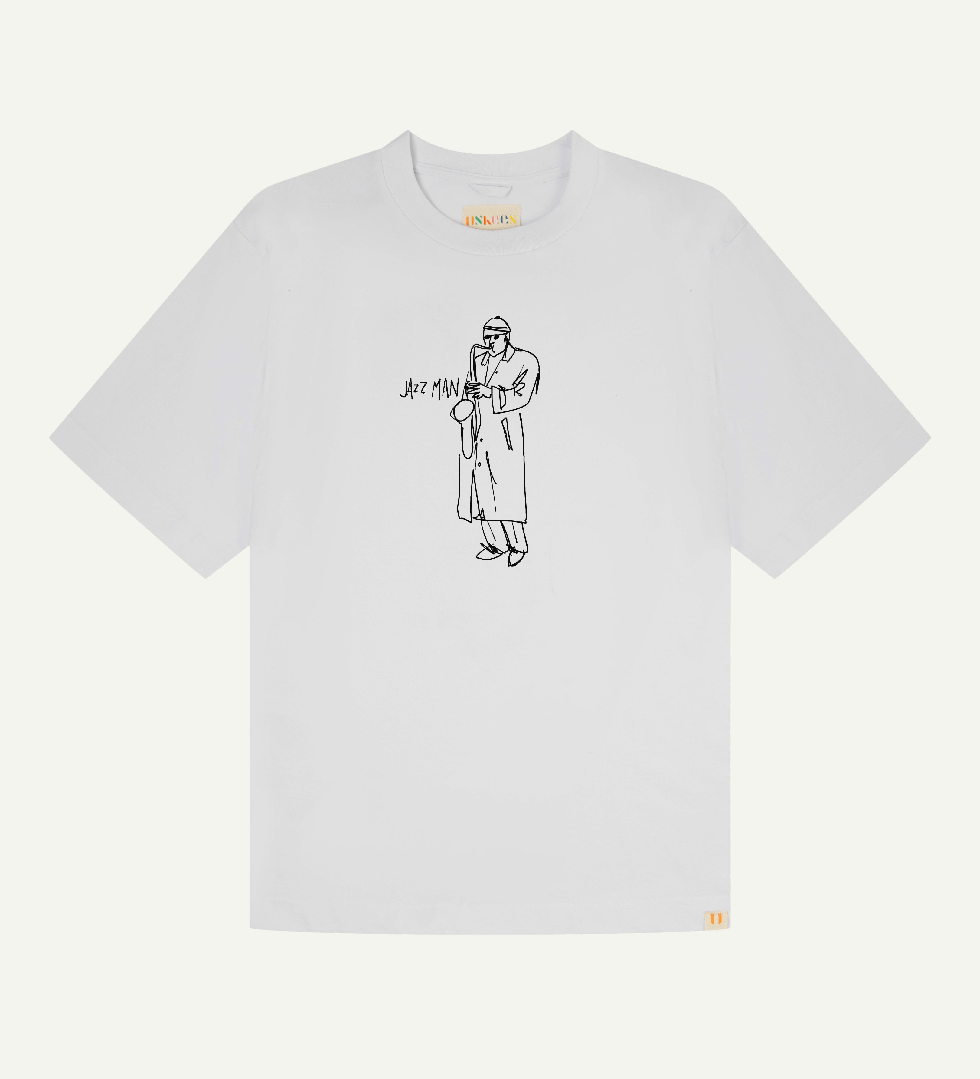 front flat shot of the uskees oversized graphic T-shirt for men in white showing the 'Jazz Man' line drawing in black