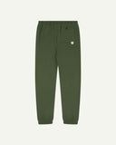 Back view of coriander-green organic cotton joggers by Uskees showing the back pocket.