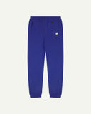Back view of ultra-blue organic cotton joggers by Uskees showing the back pocket.