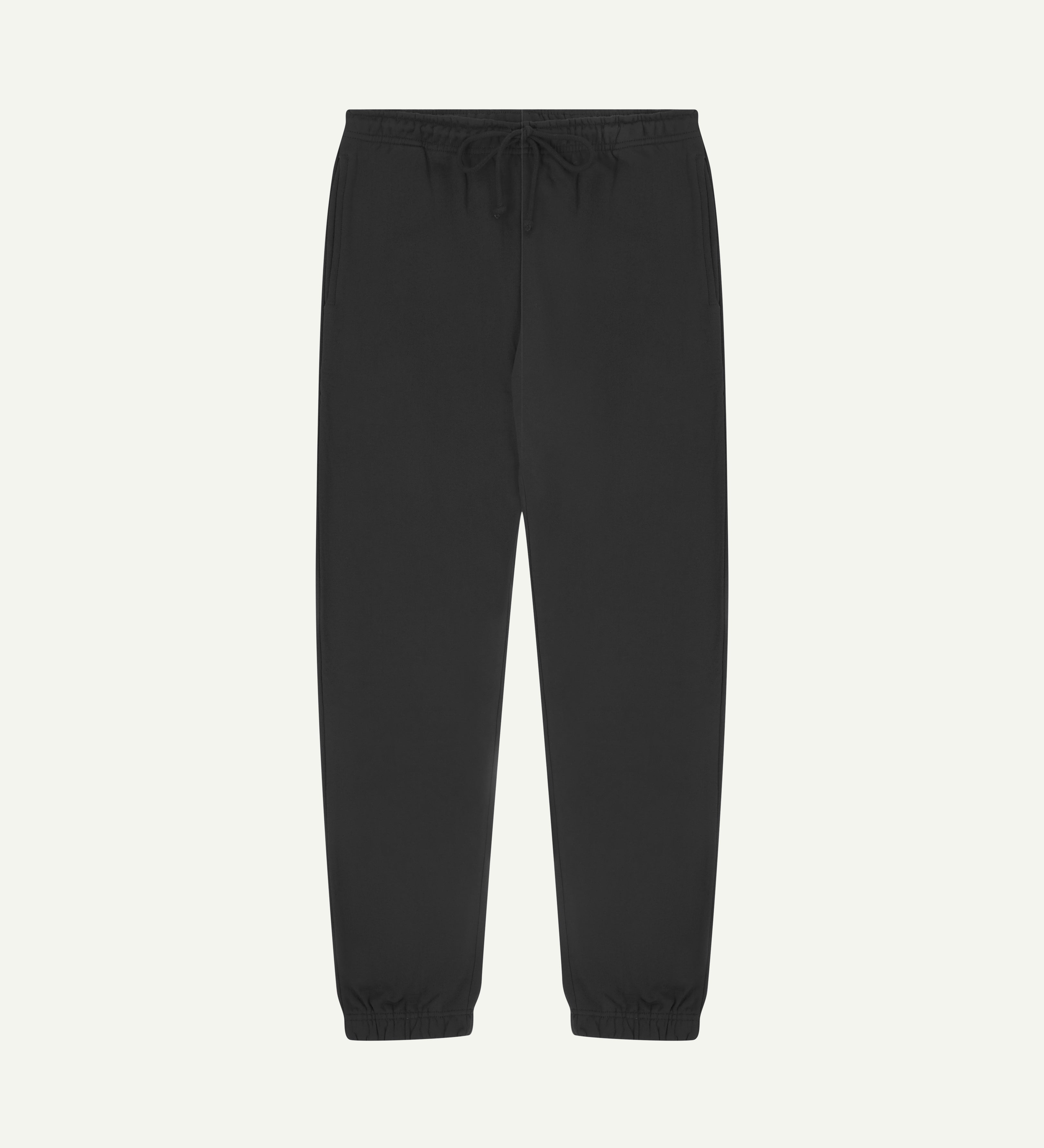Front view of dark grey organic cotton Jogging Pants for men by Uskees.