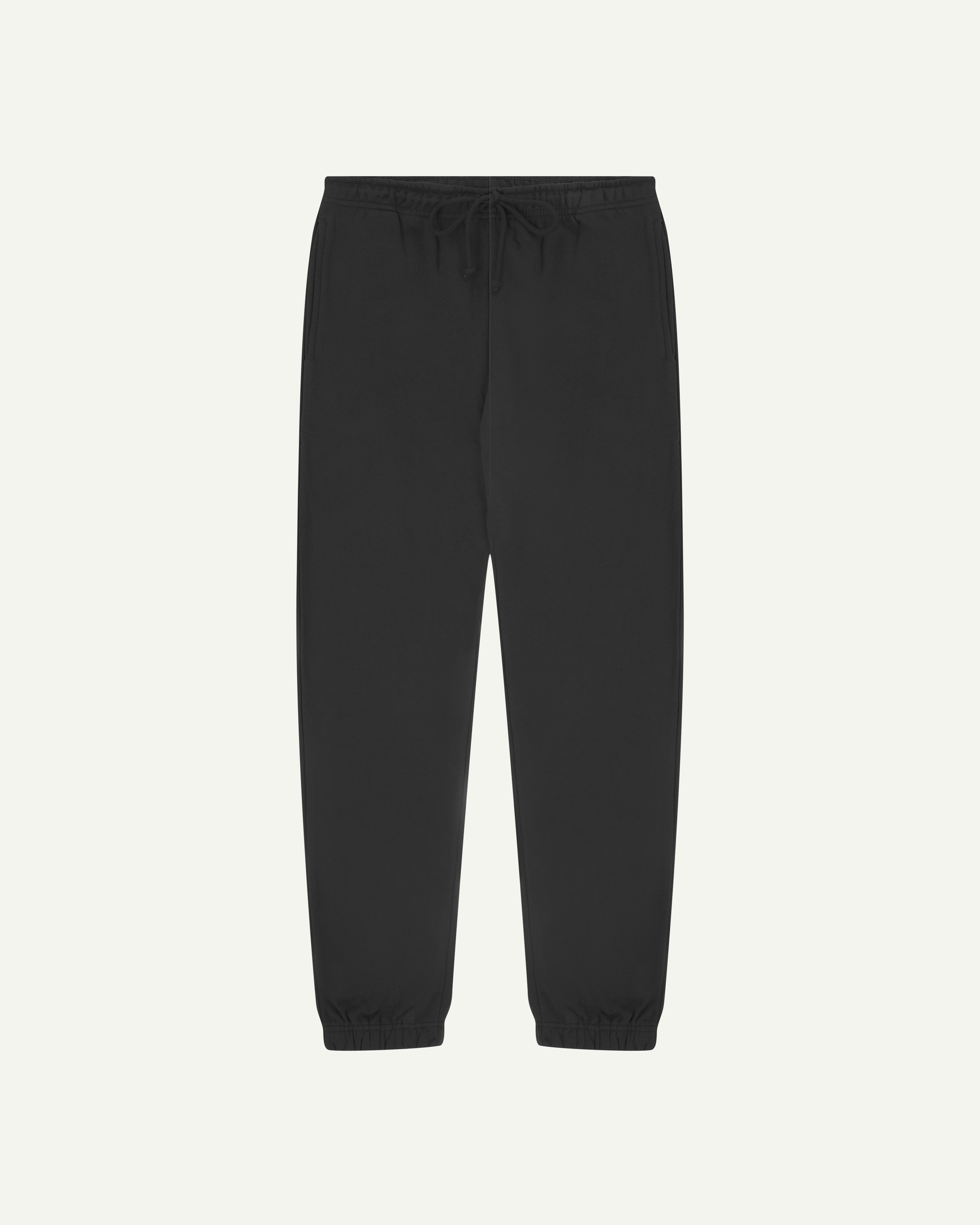 Front view of dark grey organic cotton Jogging Pants for men by Uskees.