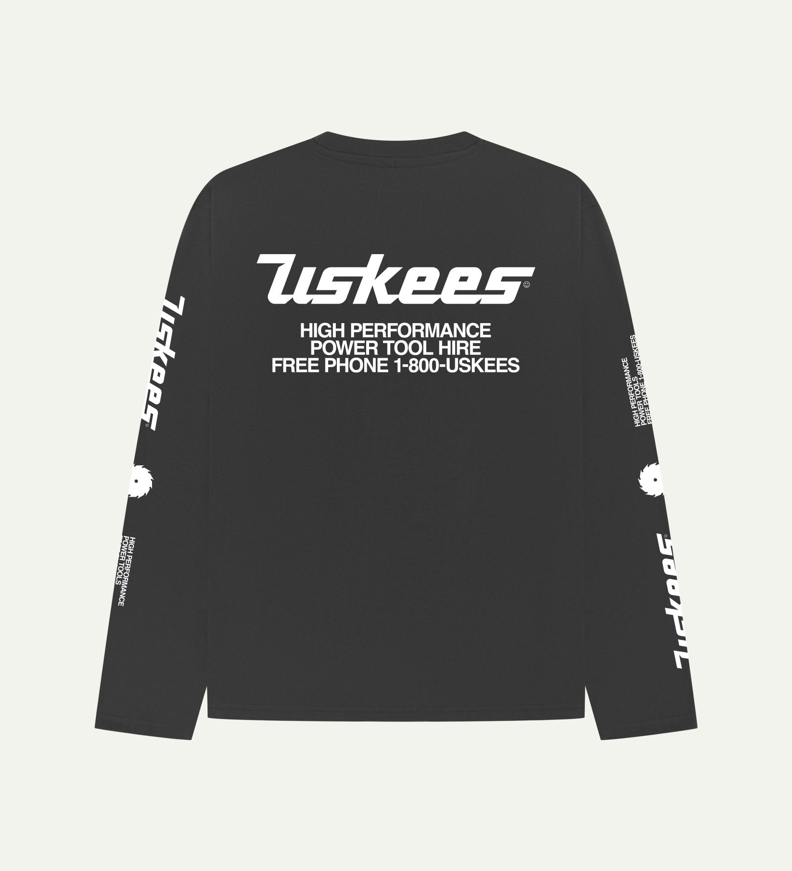 Reverse view of Uskees men's long-sleeve graphic t-shirt in black showing large 'Uskees Power Tools' motif on back.