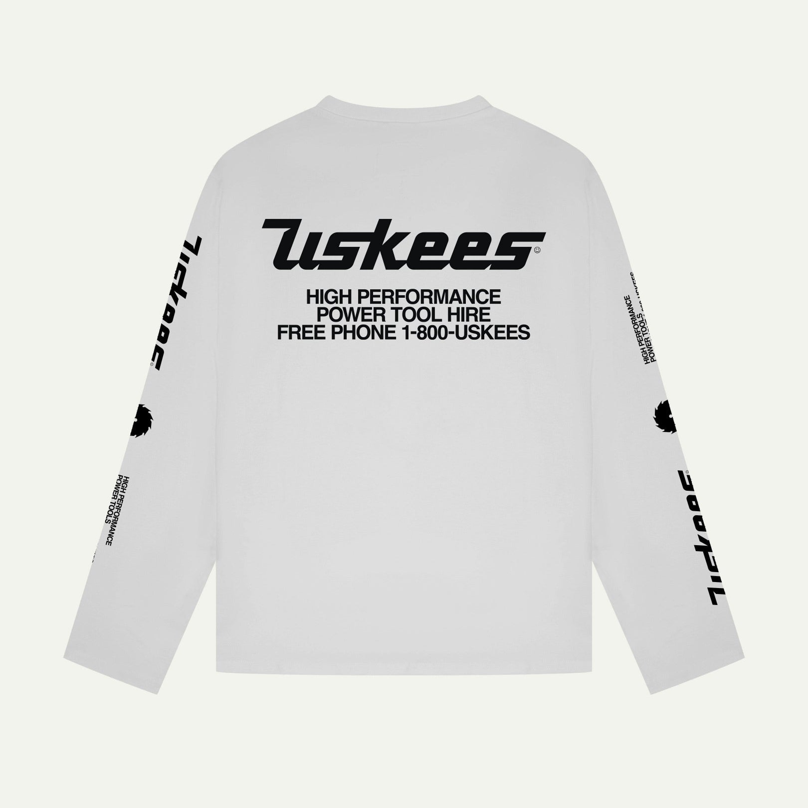 Reverse view of Uskees men's long-sleeve graphic t-shirt in white showing large 'Uskees Power Tools' motif on back.