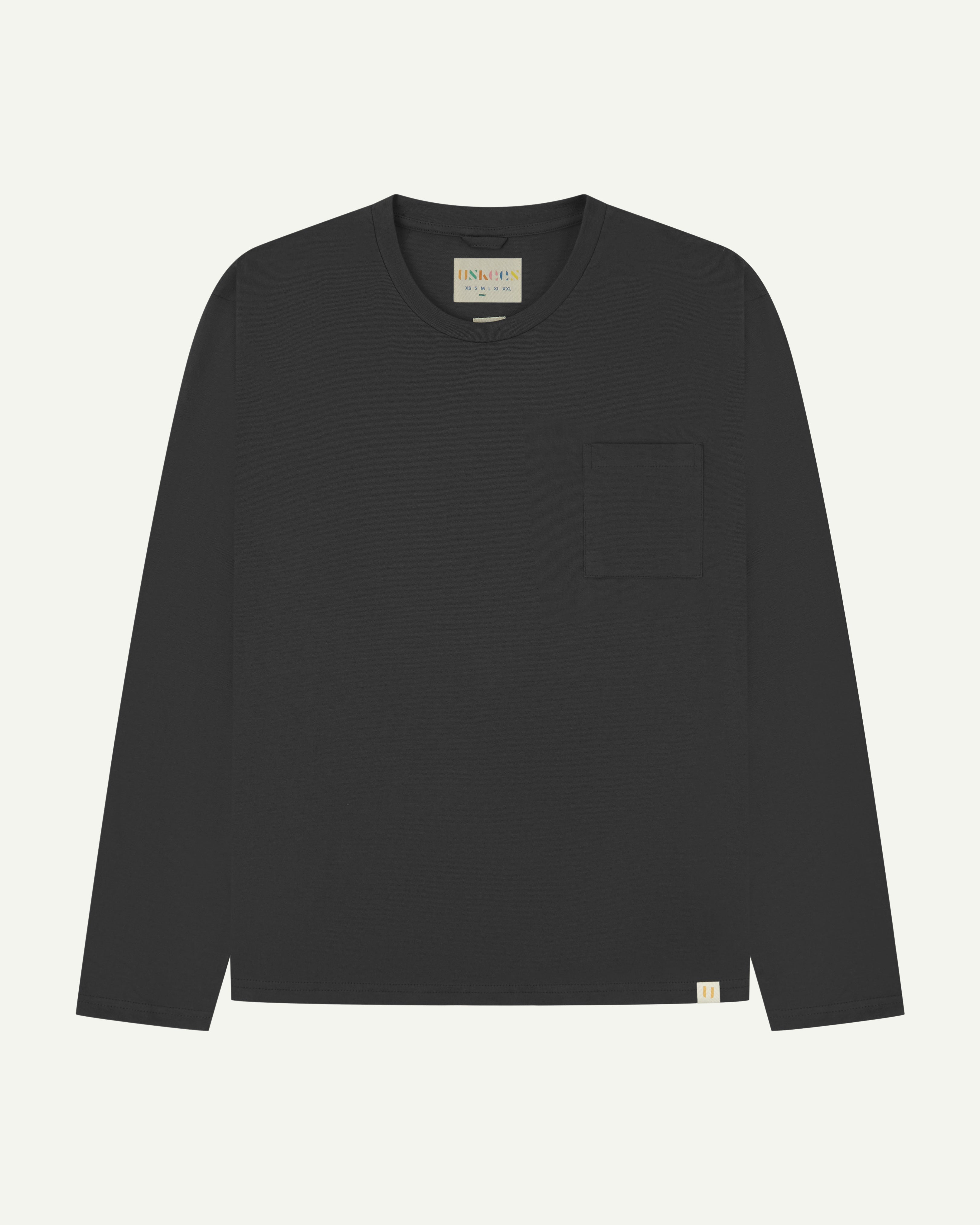 Front flat shot of long sleeve Uskees t-shirt in faded black showing breast pocket and discreet Uskees branding at hem