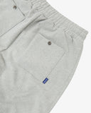 Close-up of gray marl sweatpants for men showing the elasticated waist, back pockets and metal popper fastening.