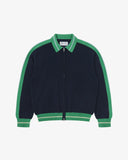 Front flat view of an Uskees navy blue zip front jacket with green accents, presented on a white background.