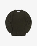 Front flat view of dark green speckled kelp, Alderney crew neck jumper in Scottish new wool. Clear view of drop shoulder design Uskees branding label.