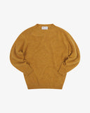 Front view of Uskees lambswool sweater in buckthorn (mustard yellow).