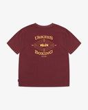 Back view short sleeve dark red men's T-shirt with Uskees Boxing Club graphic in gold on a white background.