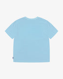 Back view flat shot of an Uskees pale blue men's t-shirt with the uskees brand tab clearly visible on the side seam.