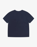 Back view of the Uskees navy blue organic cotton jersey T-shirt showing the loose silhouette.