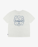 Back flat view of an Uskees men's graphic T-shirt with 'Uskees Ski Club' in blue on the back of a white Tee.