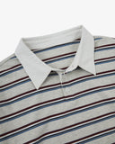 Close up view of an Uskees striped men's rugby shirt showing the grey/burgundy/blue stripe detail and white collar.