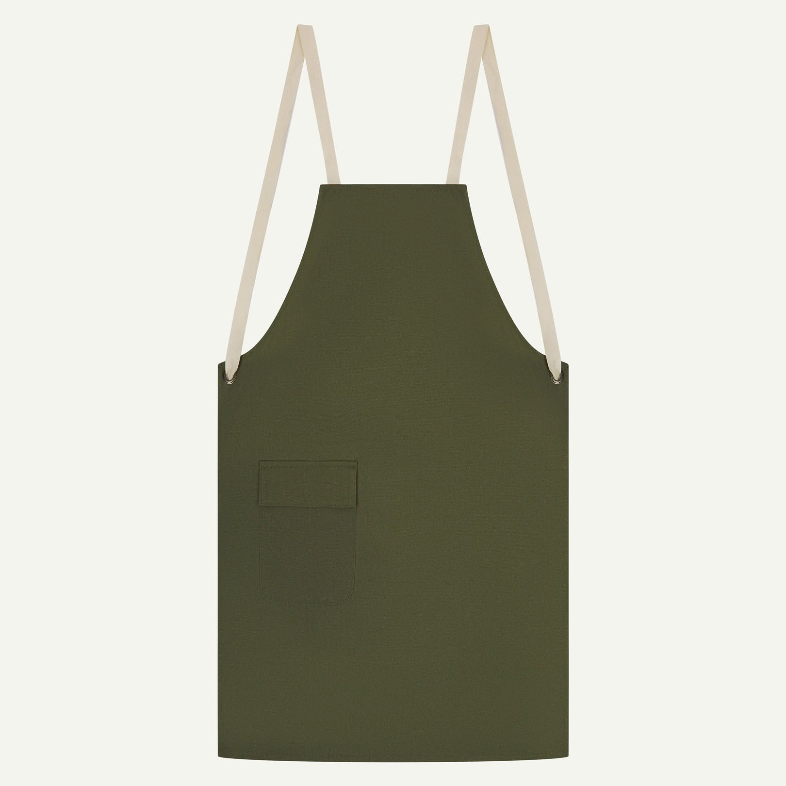 Flat shot of Uskees green canvas apron showing cream straps and front flap pocket.