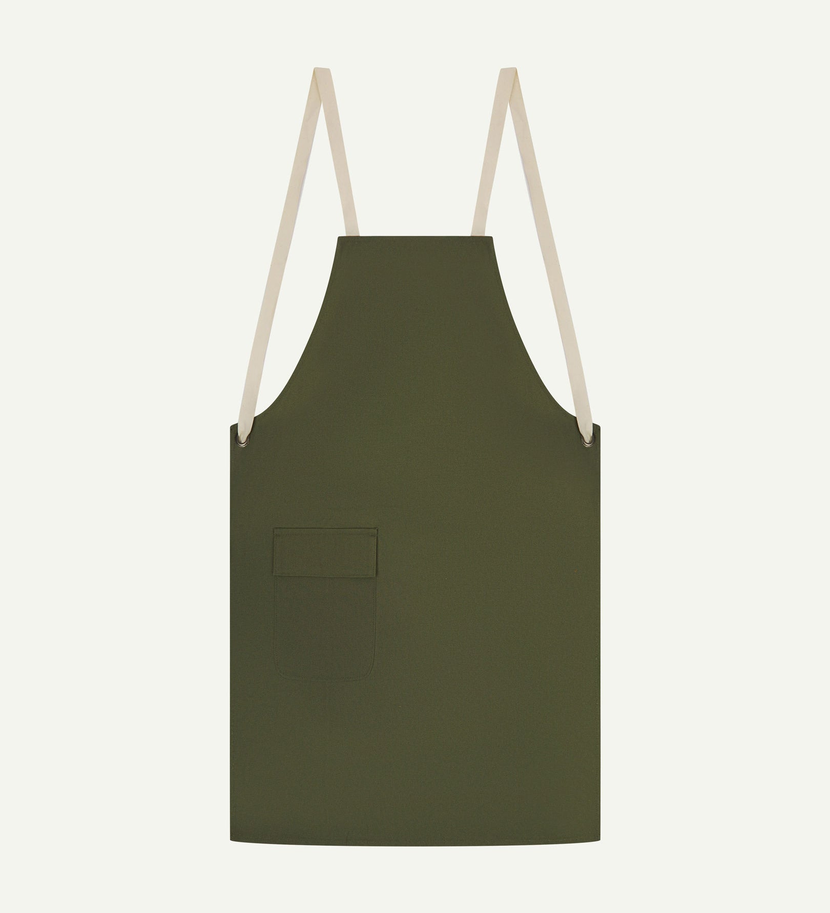 Flat shot of Uskees green canvas apron showing cream straps and front flap pocket.