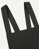 Closer angled view of Uskees Japanese-style 9003 charcoal-grey canvas apron straps.