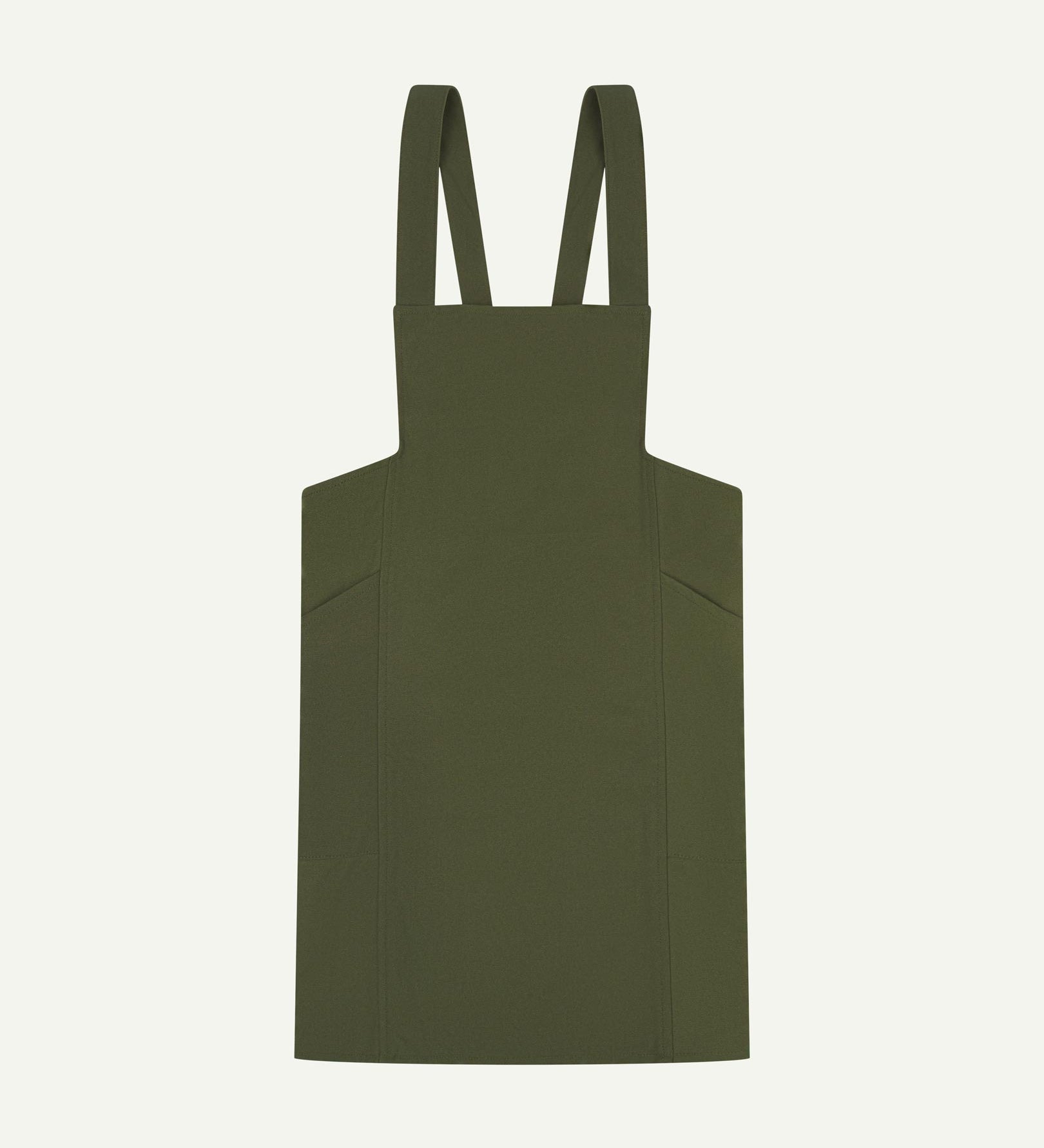 Flat shot of Uskees Japanese-style 9003 coriander-green canvas apron showing straps and two side pockets.