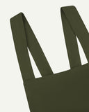 Closer angled view of Uskees Japanese-style 9003 coriander-green canvas apron straps.