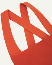 Closer angled view of Uskees Japanese-style 9003 gold-orange canvas apron straps.