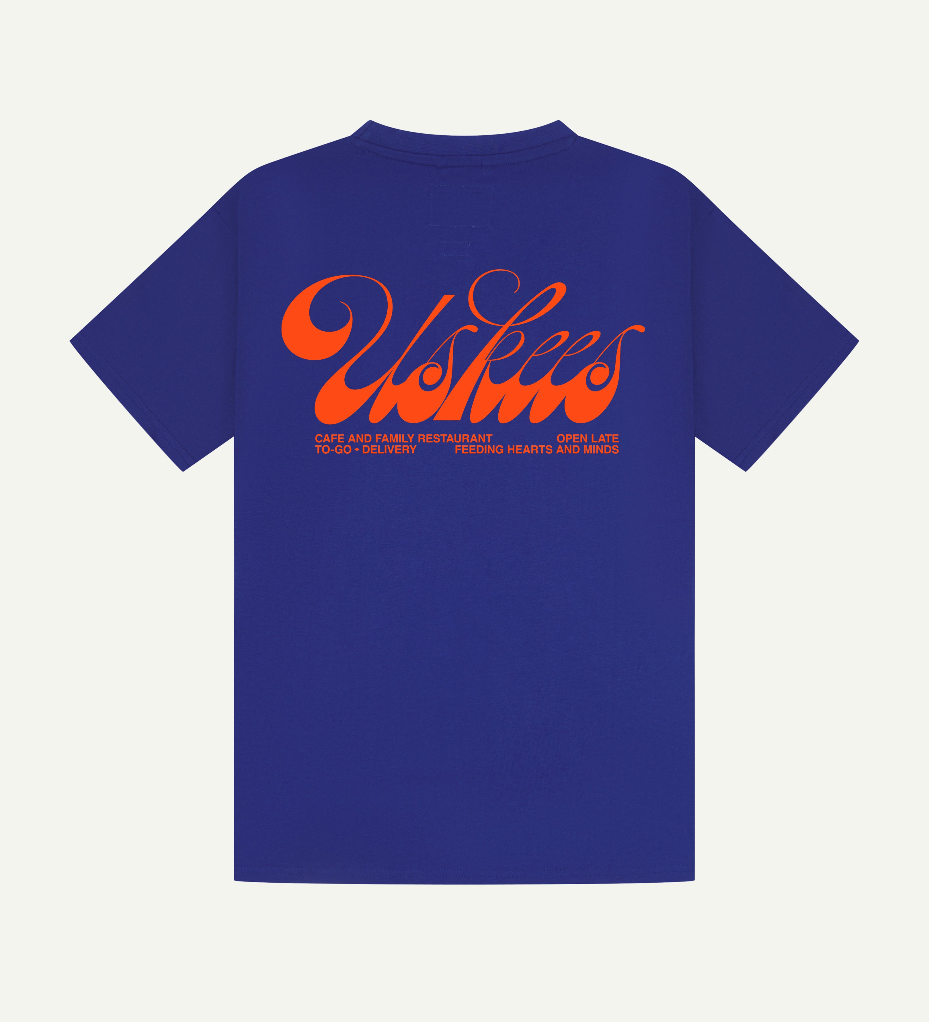 Back flat shot of the uskees men's graphic Tee in ultra blue showing the 'diner' logo in orange