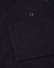 Close up shot of Uskees dark blue corduroy 3001 over-shirt  showing sleeve detail