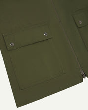 front flat close shot of uskees #3028 green zip front vest waistcoat in cotton canvas showing the front flap pockets and the double-ended zip