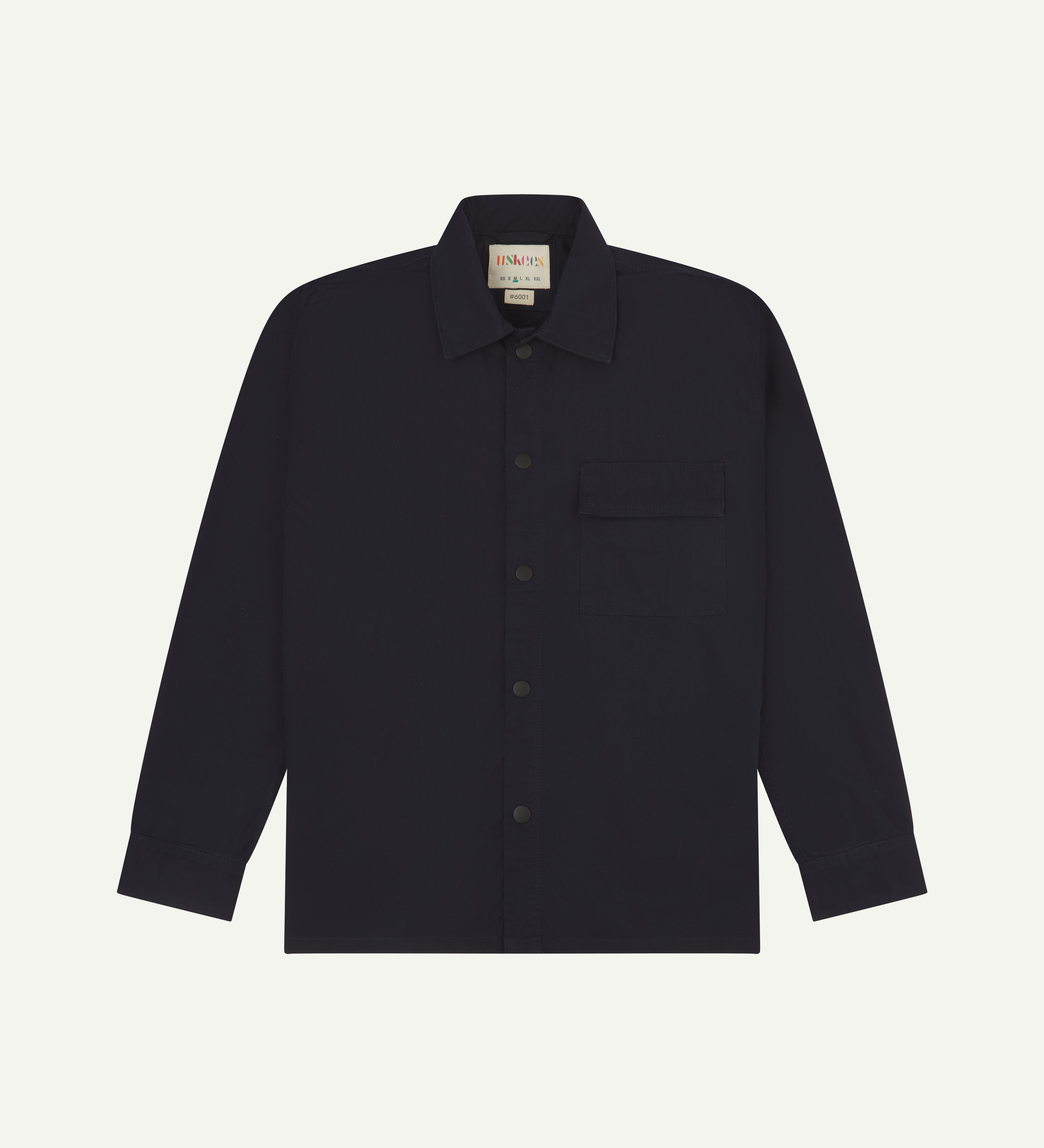 front flat shot of dark blue uskees lightweight shirt with popper front fastening