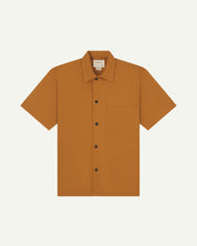 front flat shot of uskees lightweight tan men's shirt with short sleeves showing black popper fastenings