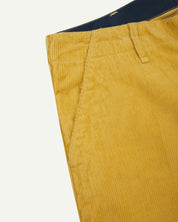 Close up shot of Uskees #5012 corduroy trousers showing contract coloured inside waistband