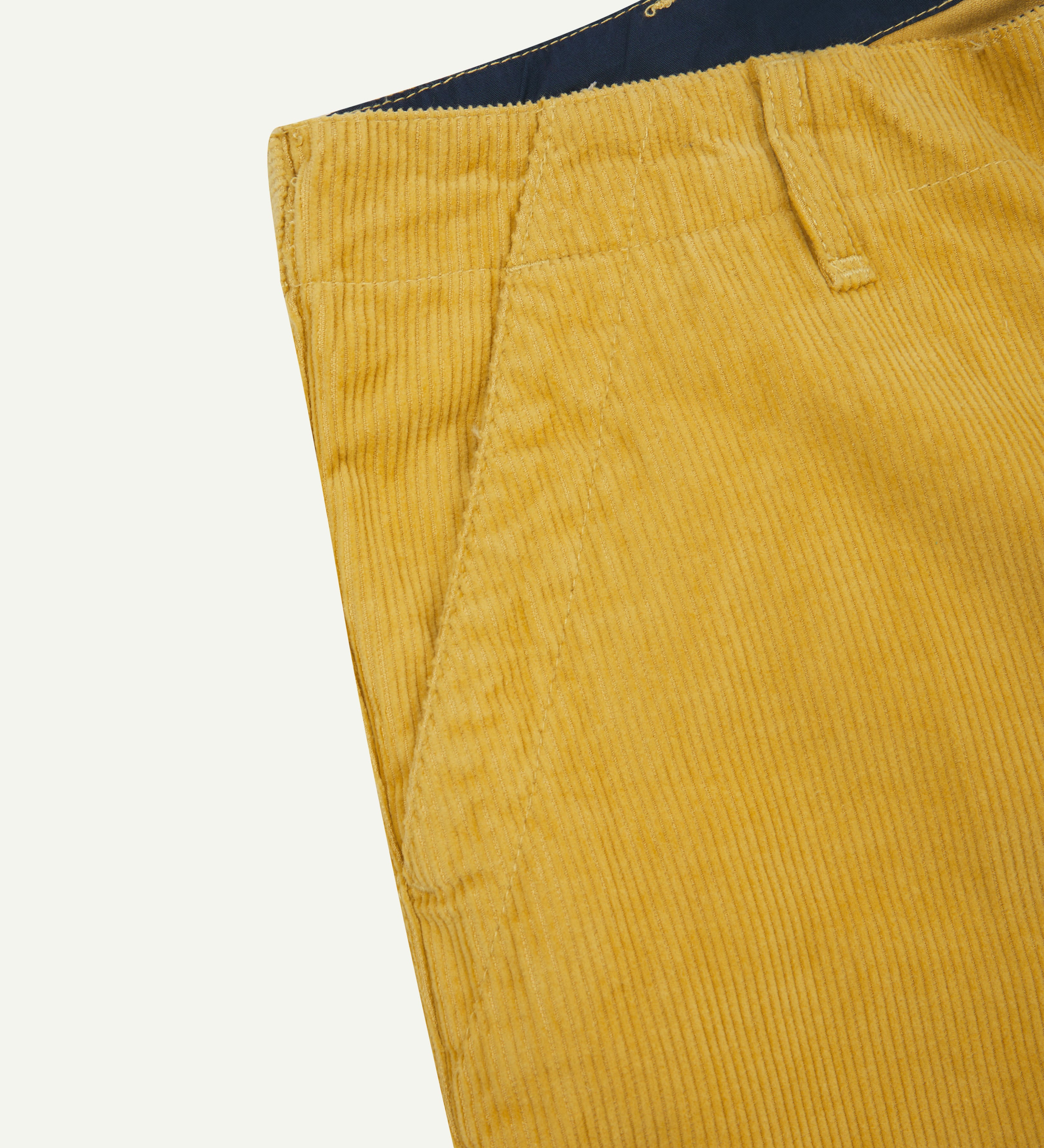 Close up shot of Uskees #5012 corduroy trousers showing contract coloured inside waistband