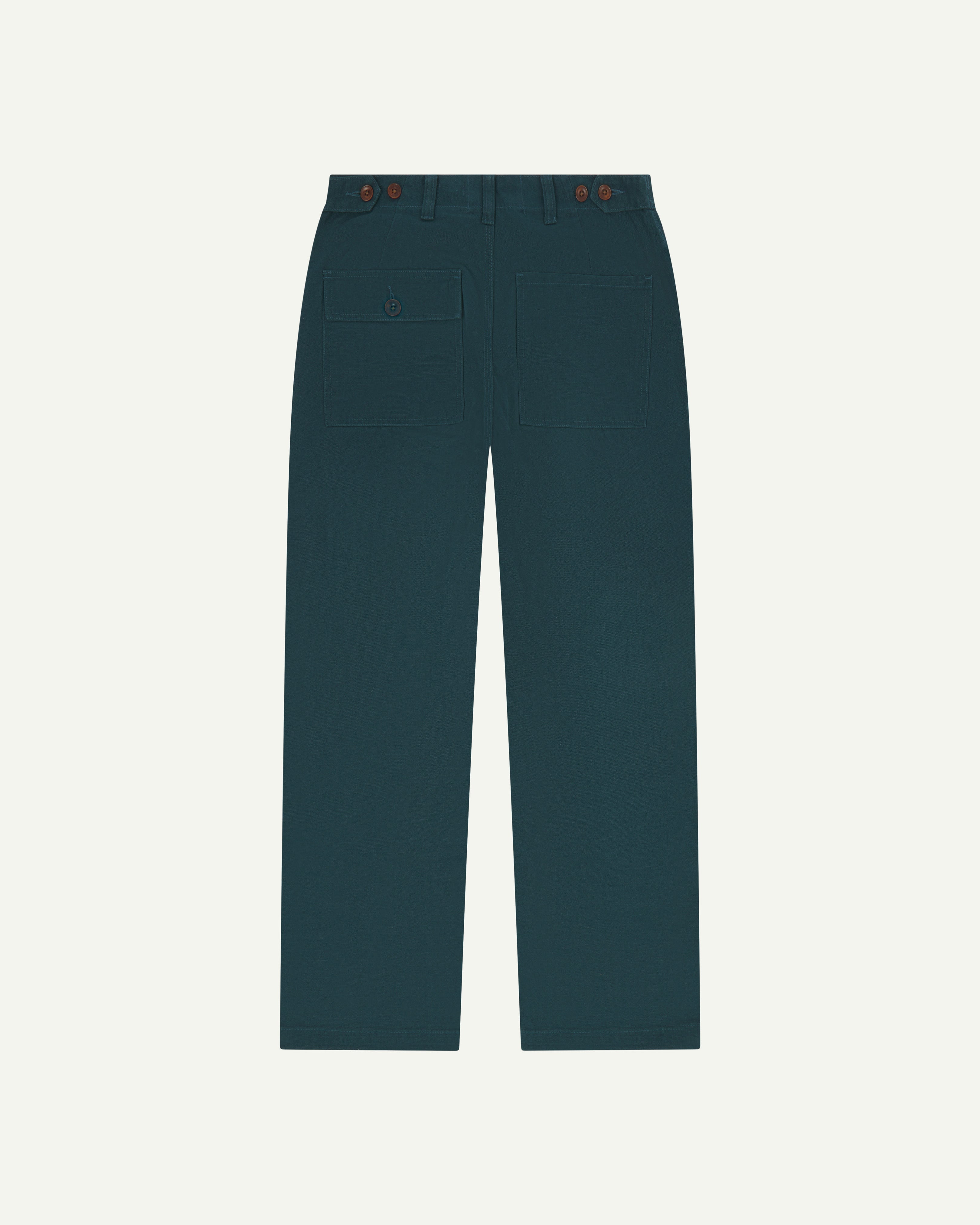 Flat view of back of #5005 Uskees men's organic cotton 'peacock' coloured trousers on white background.