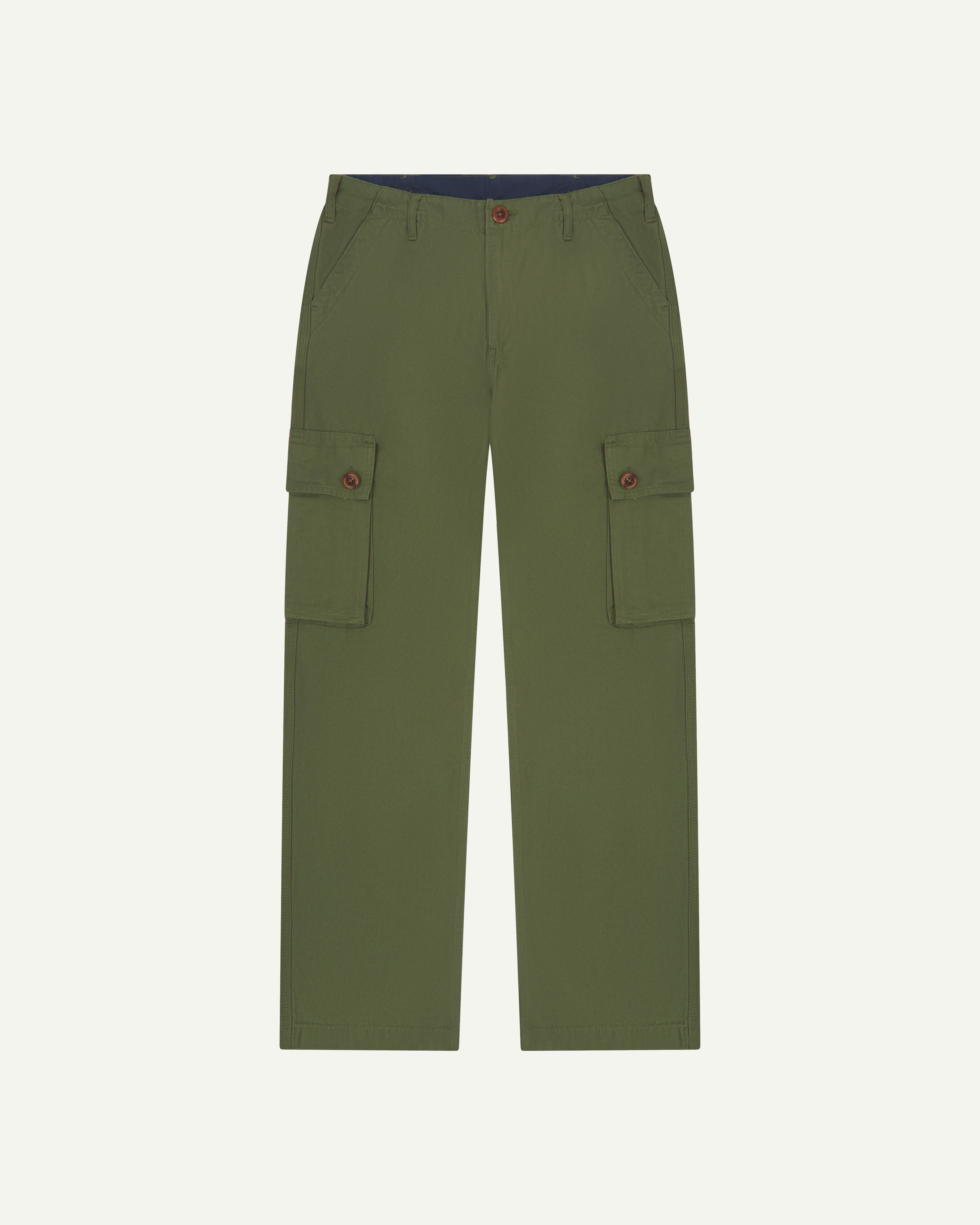 Flat front shot of #5014 Uskees men's organic cotton 'coriander-green' cargo trousers with view of adjustable waistband and pockets.