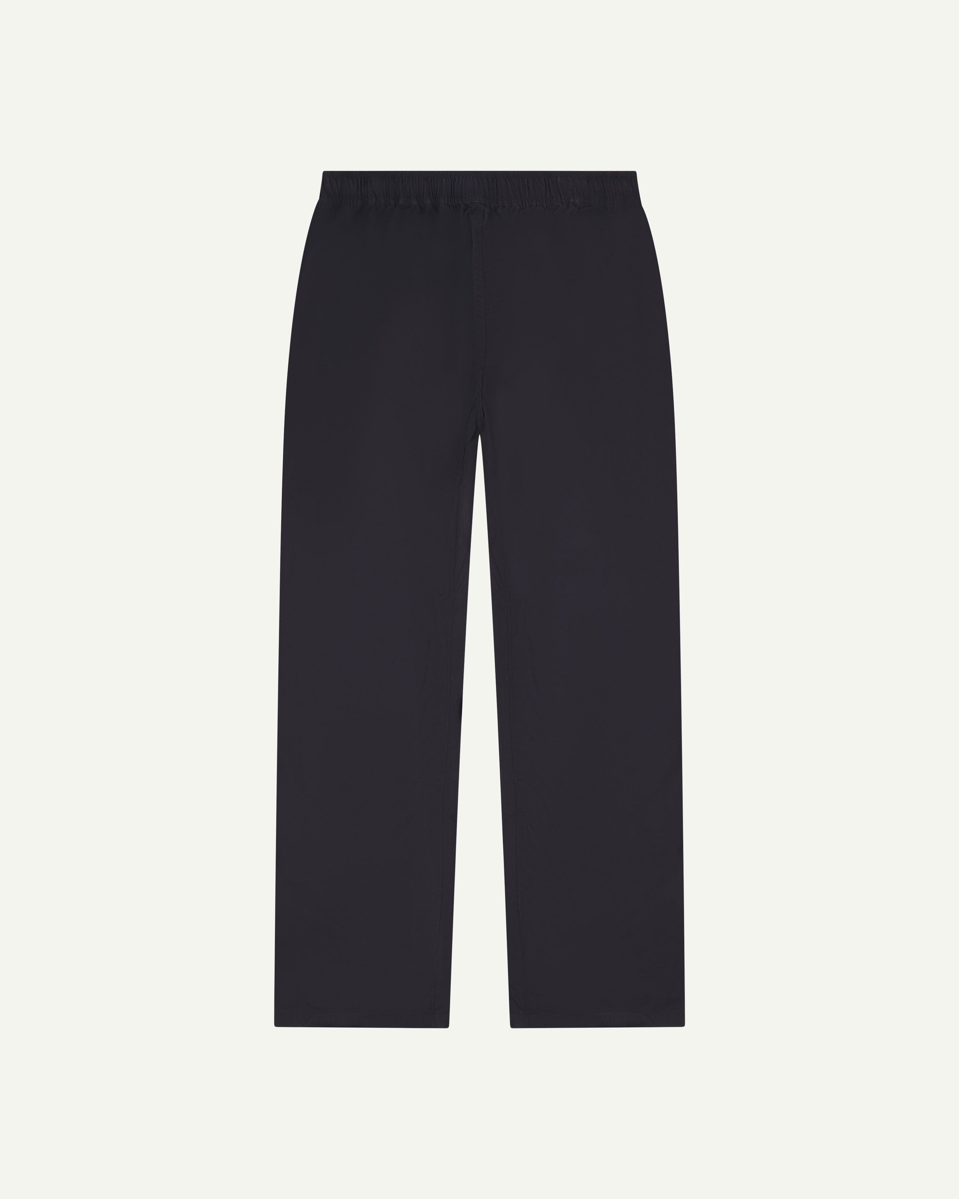 Flat back shot of the Uskees 5020 lightweight utility pants in midnight blue showing drawstring waist