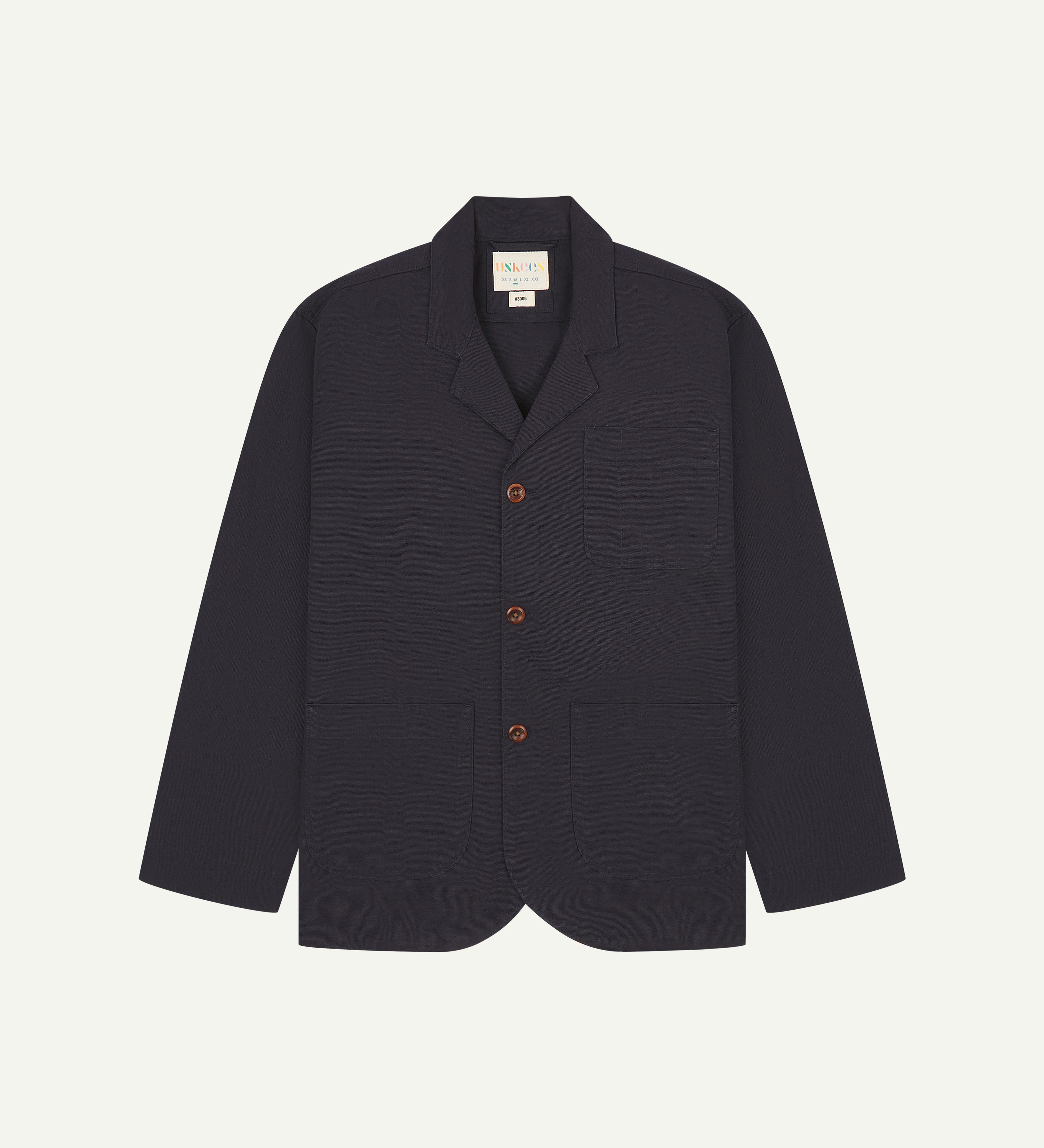 Front view of midnight blue blazer with 3 patch pockets from Uskees.
