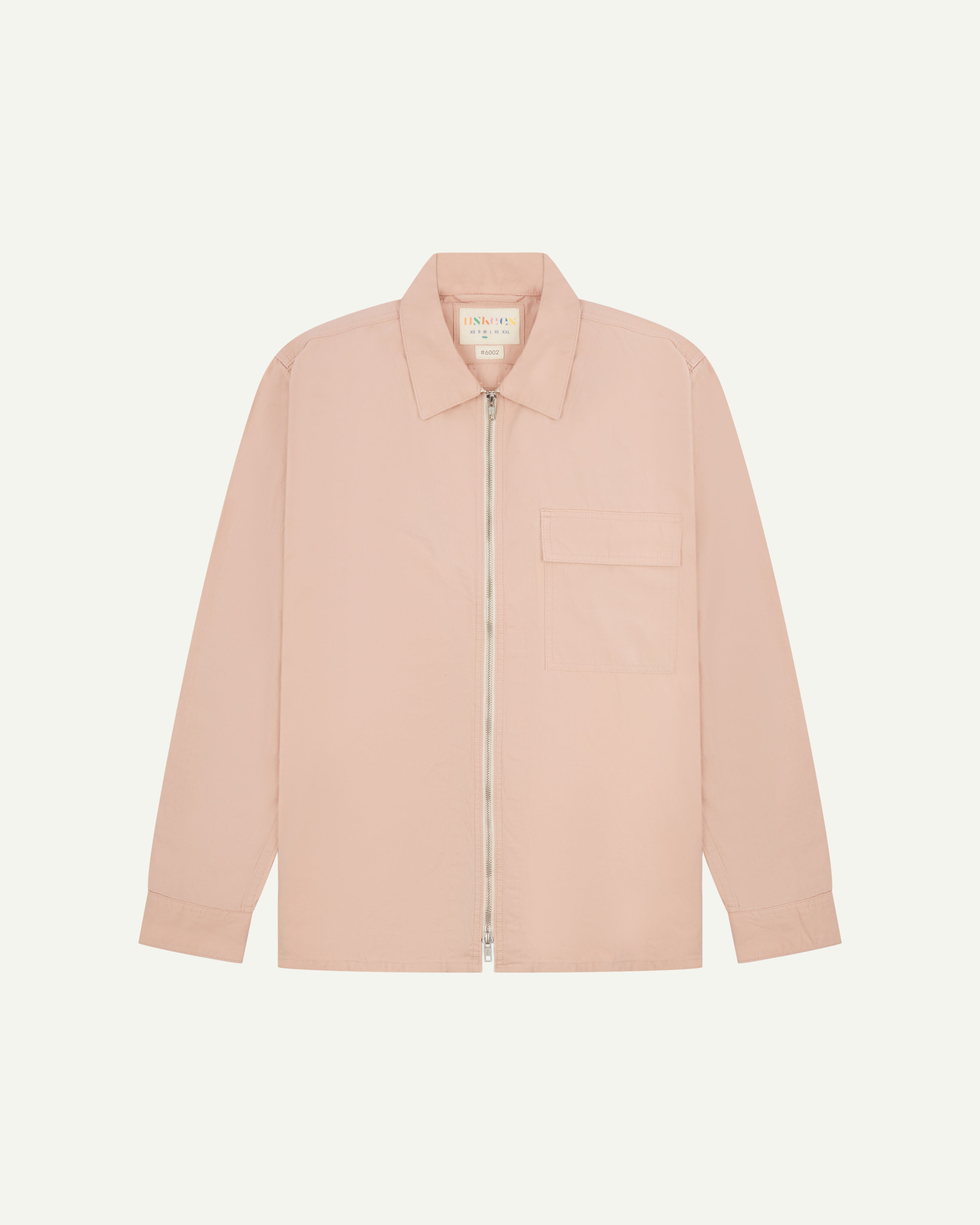 flat front shot of uskees zip front lightweight men's jacket in dusty pink showing the brand/size label